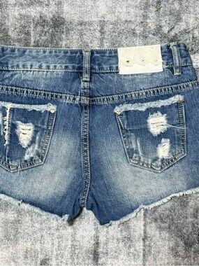 Women’s Blue Distressed Jean Shorts